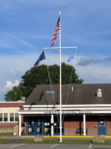 Nautical yardarm flagpole at the Thomaston Municipal Building