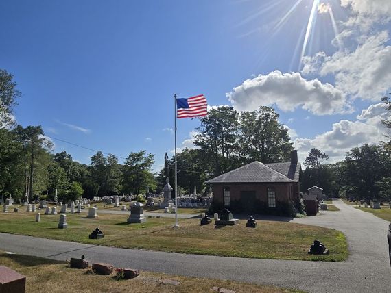 Memorial flagpole in a Maine cemetery